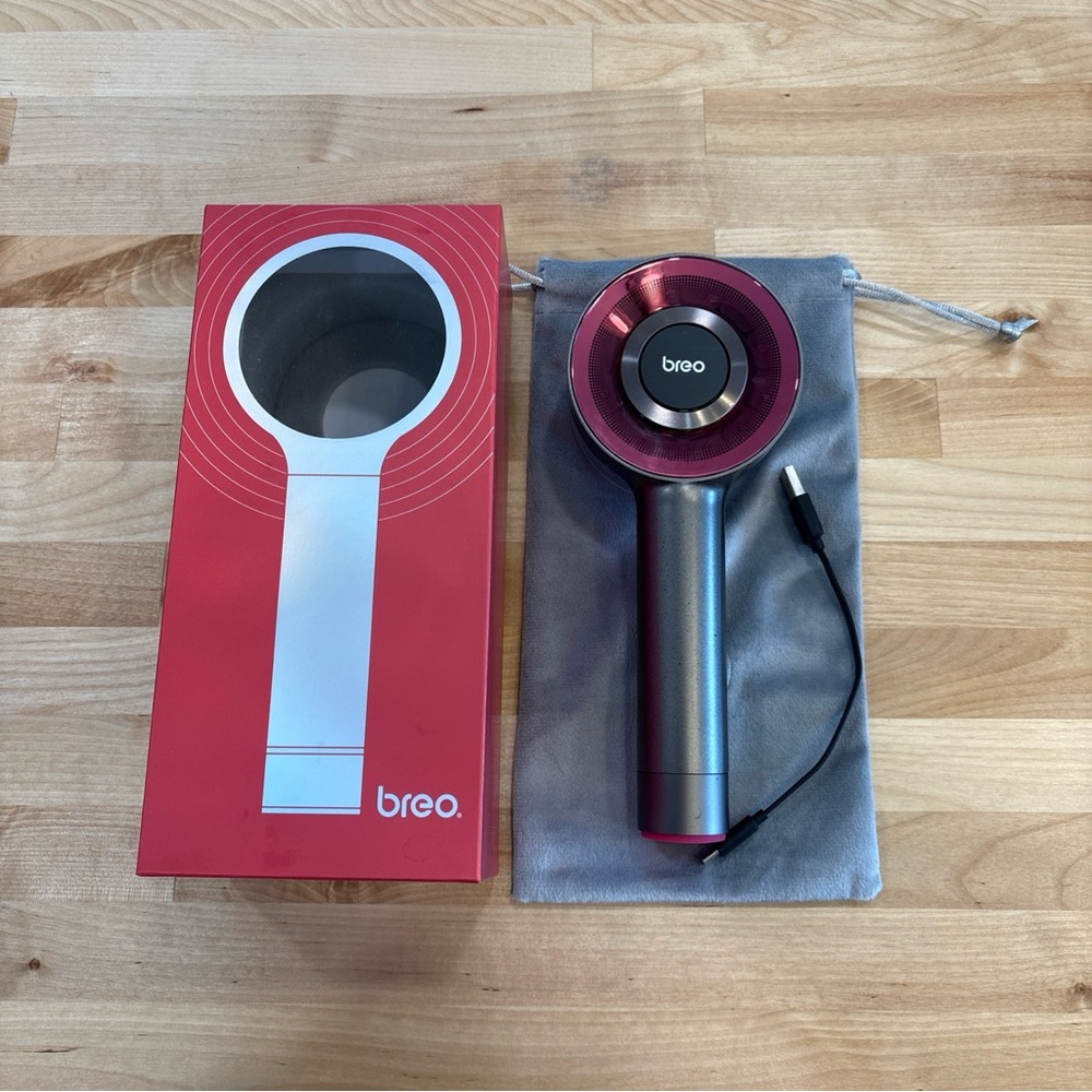 Red and Silver Handheld Massager